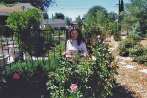 Photo of Gabriele tending to her roses